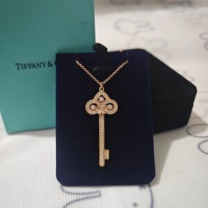 Tiffany & Co. 18K Gold Iris Key Pendant